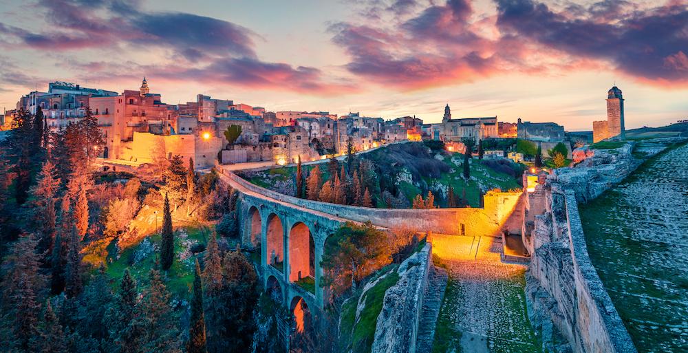 Incredible spring dawn on Gravina in Puglia tovn. Wonderful morning landscape of Apulia, Italy, Europe. Traveling concept background.