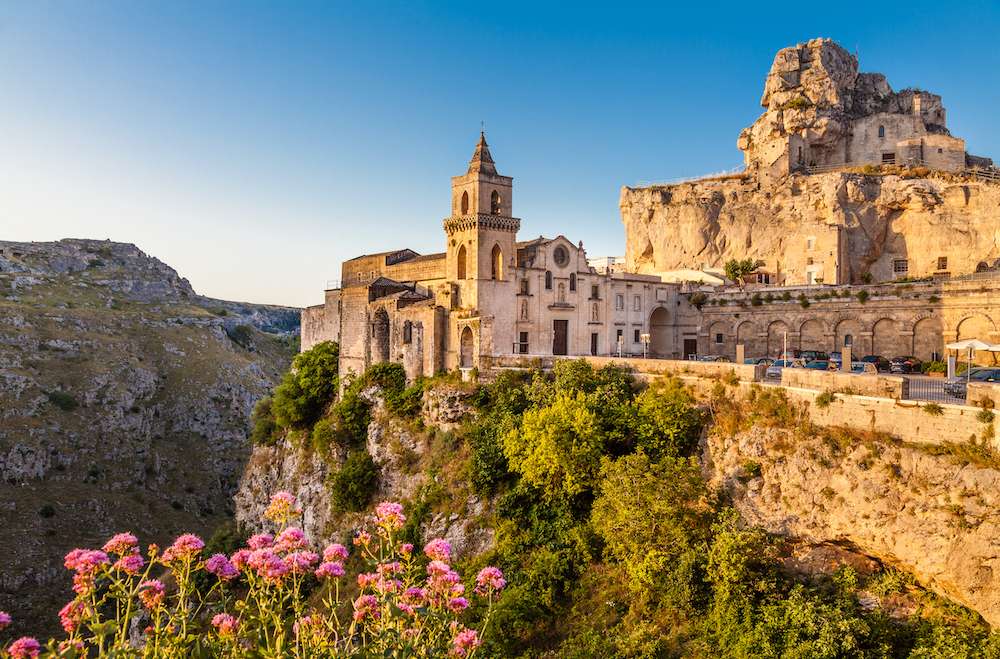 Ancient town of Matera (Sassi di Matera), European Capital of Culture 2019, in beautiful golden morning light at sunrise, Basilicata, southern Italy