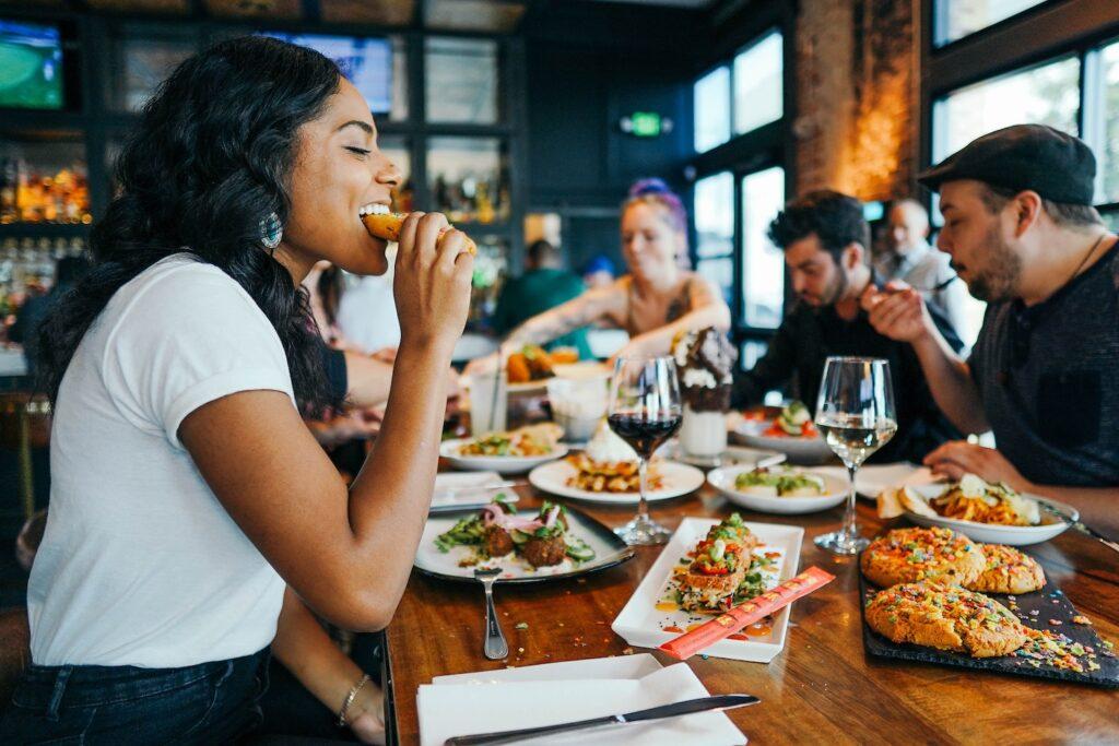 dining together in a restaurant on a group trip