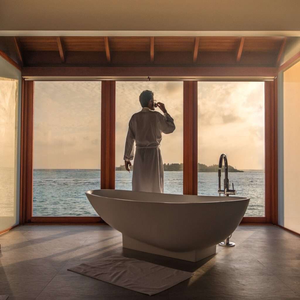 spas for men relax by tub in robe