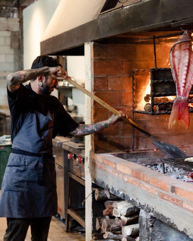 Chef Luis Aguilar cooking at NÜ Restaurant
