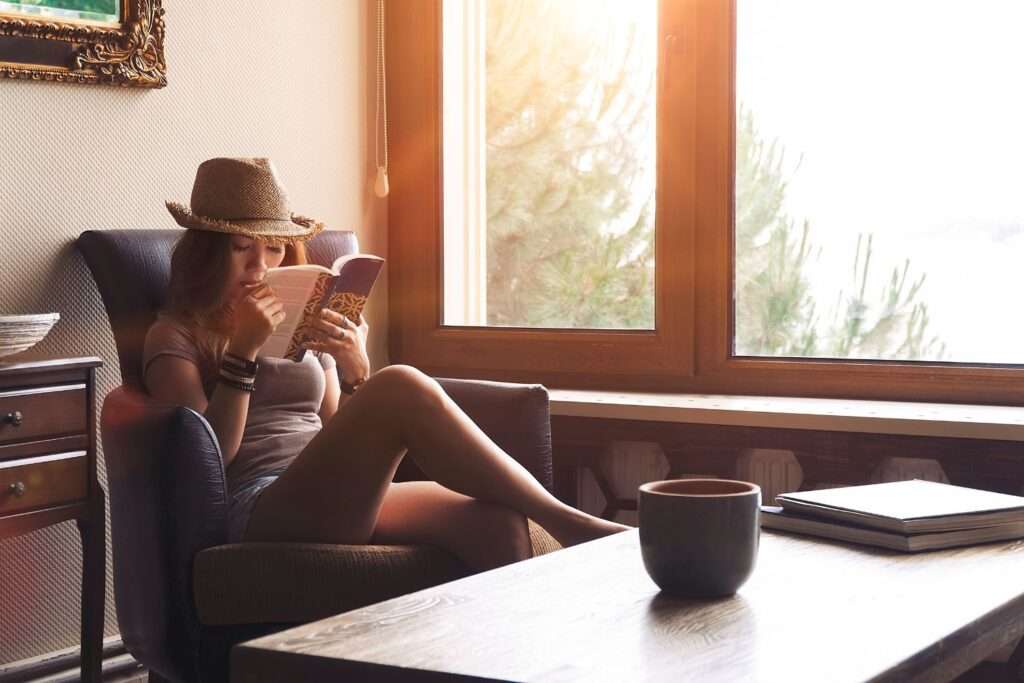 woman reading on holistic wellness vacation