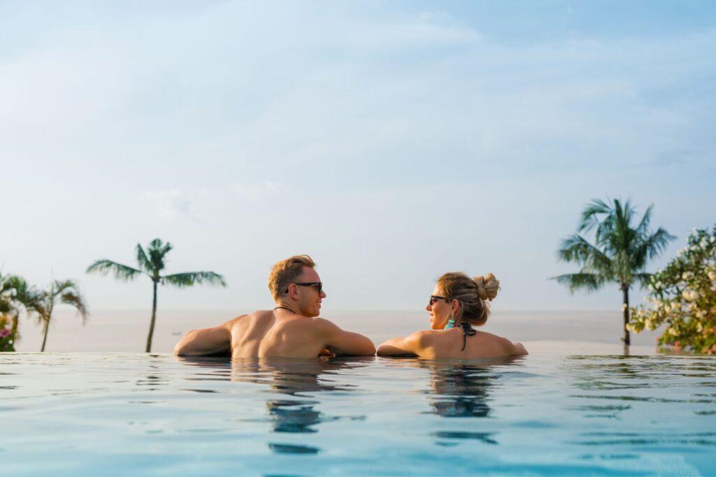 couple in infinity pool